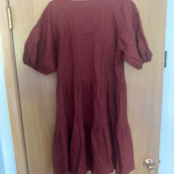 Reitman’s signature red dress - Picture 3 of 3